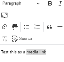 'Test this is a media link' typed on the WYSIWYG editor. 'media link' is highlighted.
